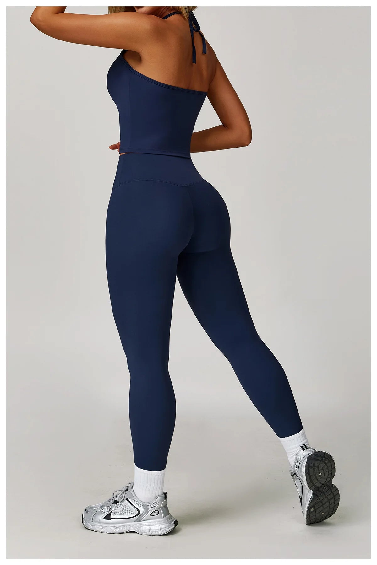 Xooie Fit navy halter tank top and leggings set for stylish and comfortable workouts