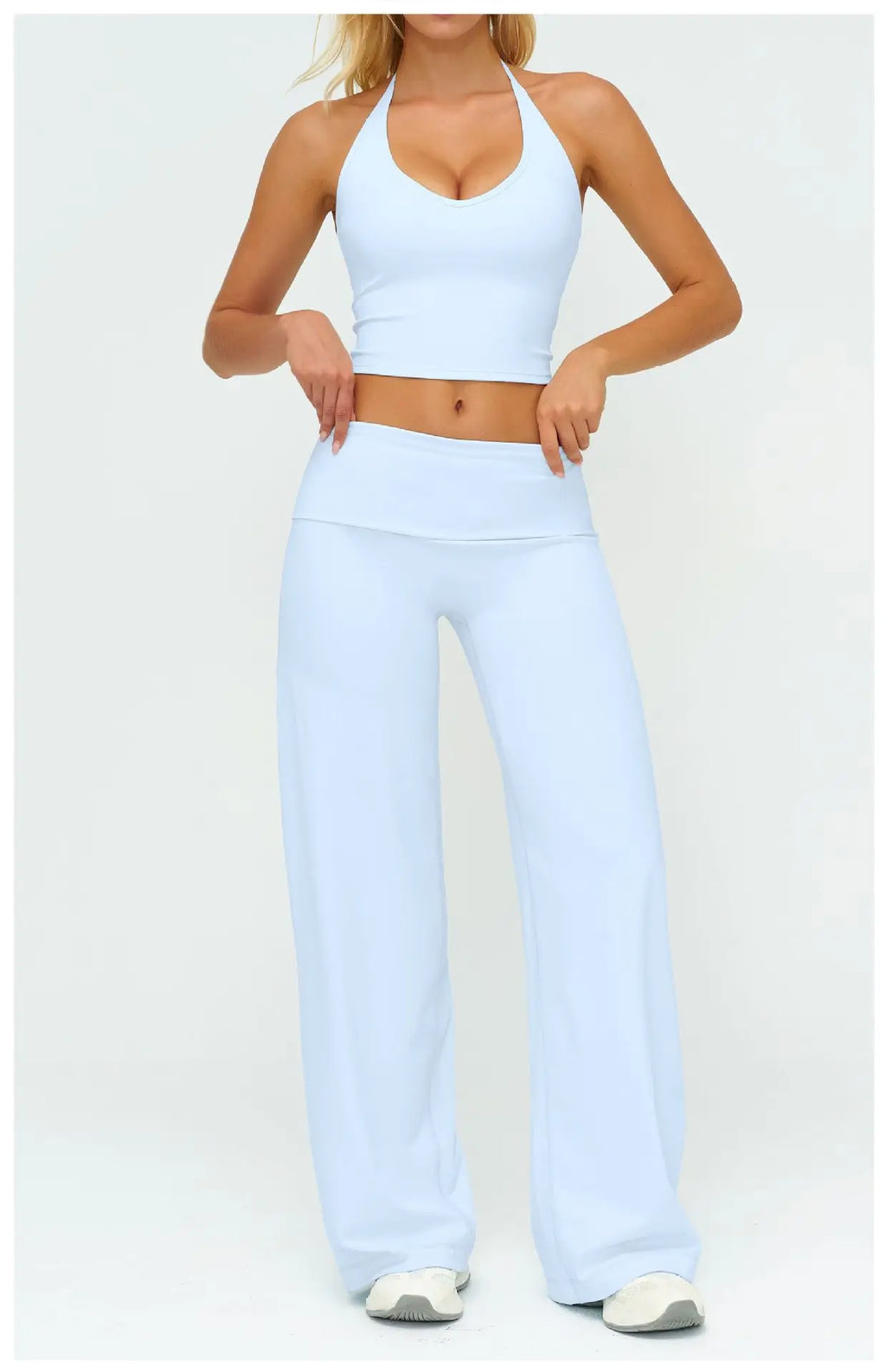 Women's yoga set with racerback sports bra and wide-leg pants, light blue