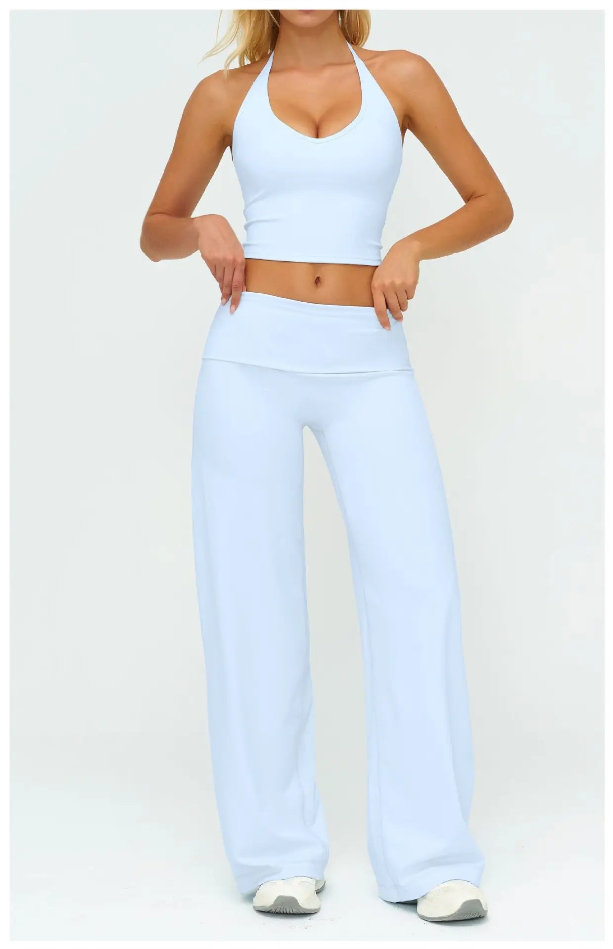 Women's yoga set with racerback sports bra and wide-leg pants, light blue