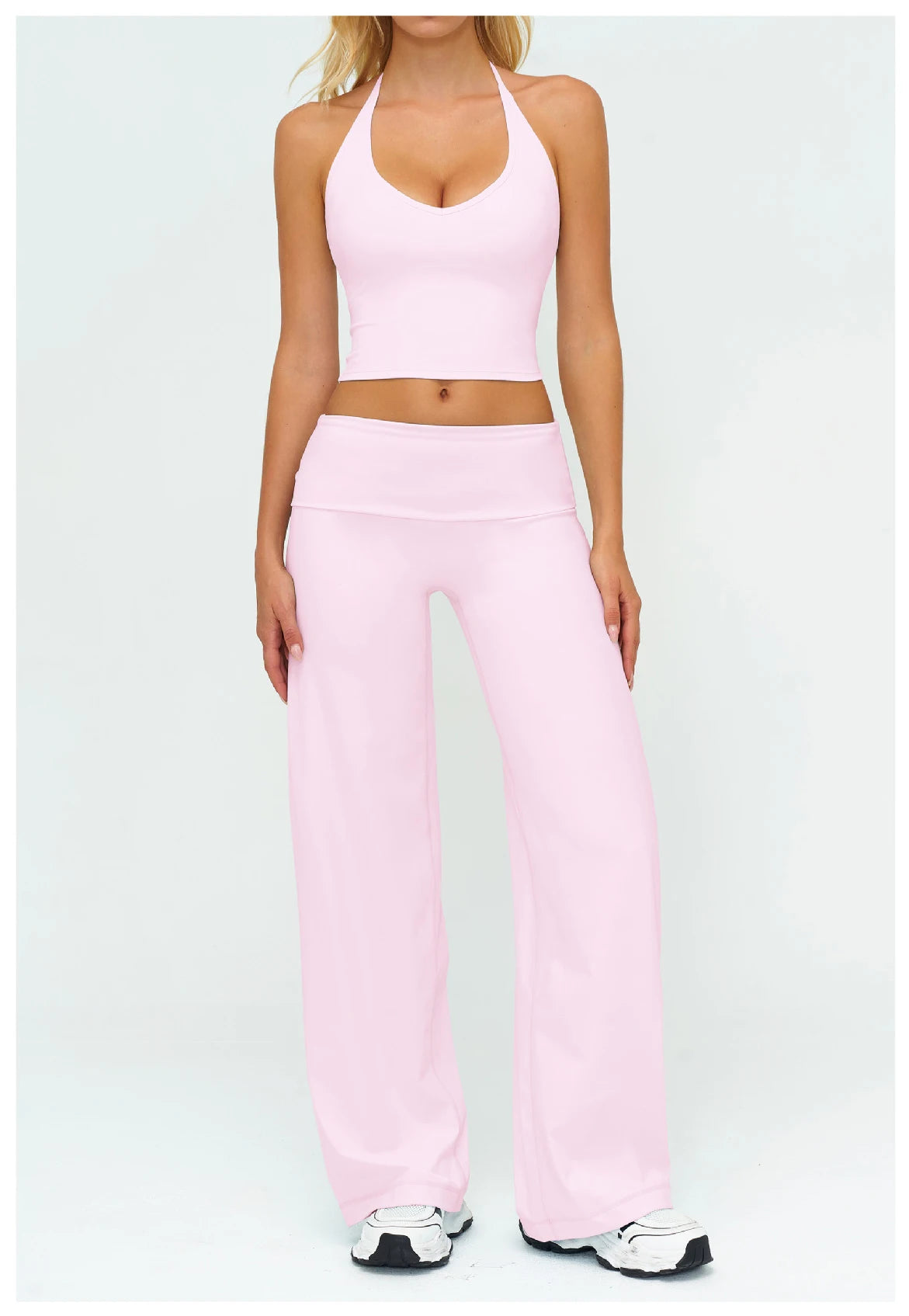 Women's yoga set with halter sports bra and high-waist wide-leg pants, light pink