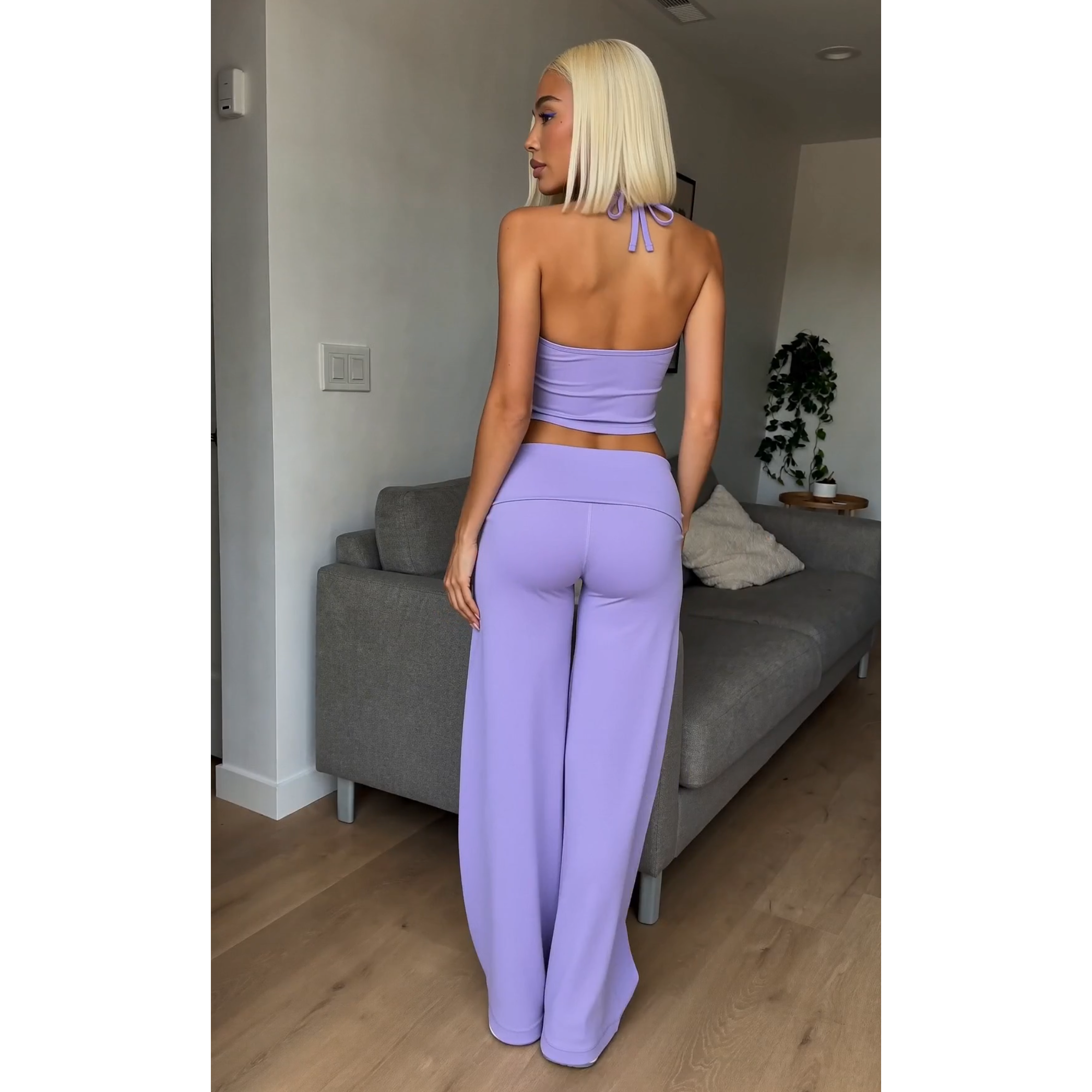 Lavender halter spaghetti-strap crop top and matching flare pants, back view with tie