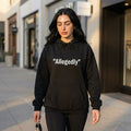 Fleece-lined pullover hoodie in black with "Allegedly" quote graphic on the chest
