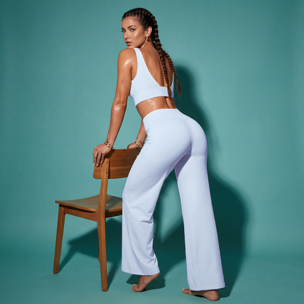 Light blue crop bra top with flare pants matching set, back-leaning side