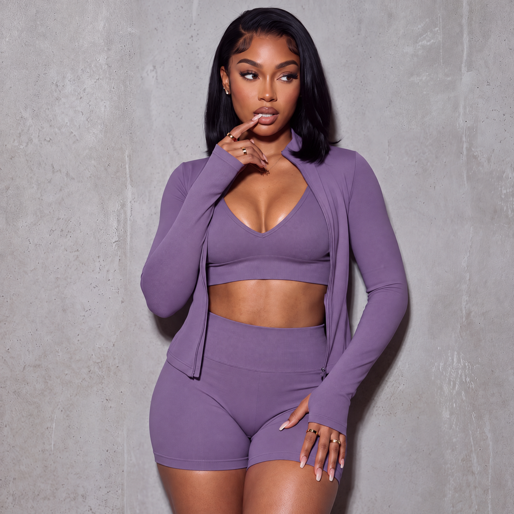 Women’s plum 3-piece active set: V-neck sports bra, high-waist shorts, zip jacket.