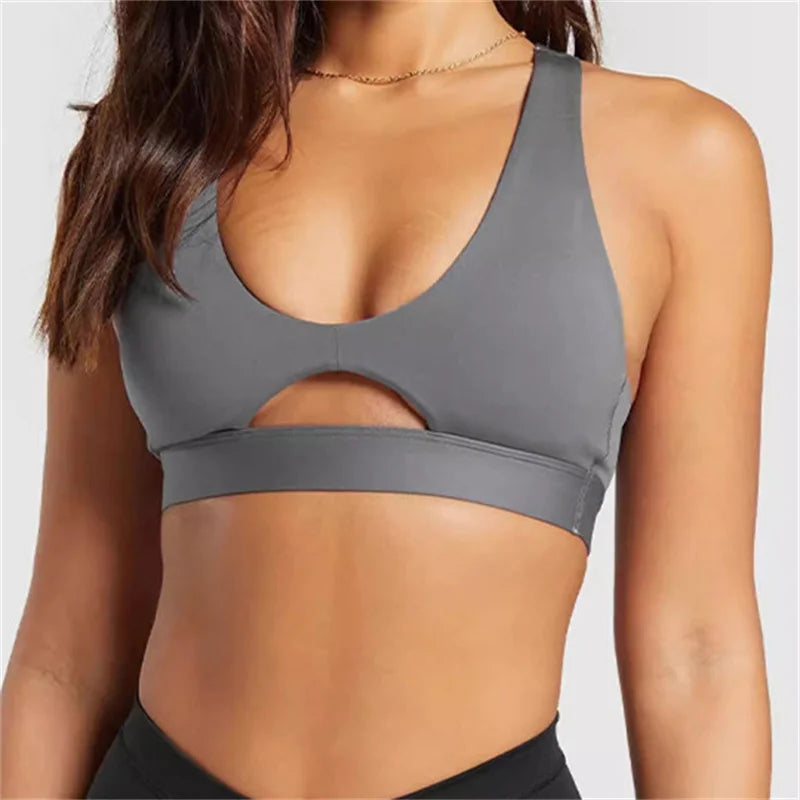 Xooie Fit high-intensity sports bra in gray with a stylish cutout design for optimal support during workouts
