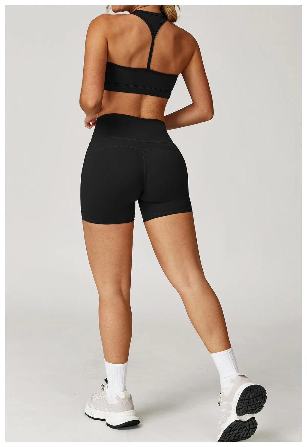 Xooie Fit two-piece set black high-performance activewear with racerback top and fitted shorts