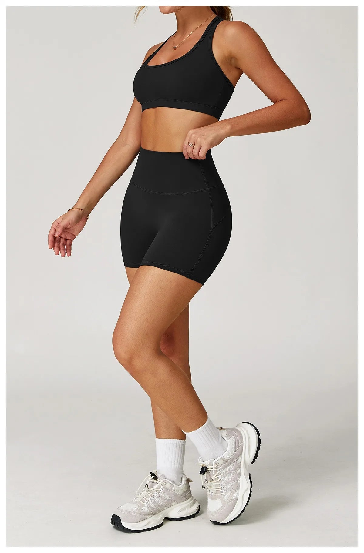 Xooie Fit two-piece set in black designed as high-performance activewear for women