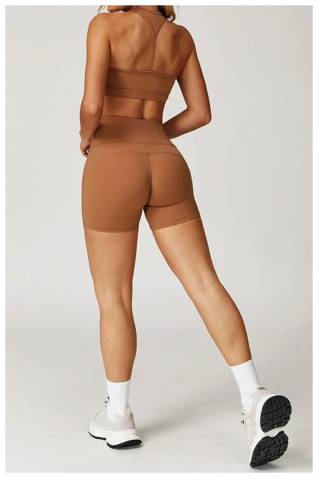 Xooie Fit brown two-piece set of high-performance activewear with shorts and sports bra