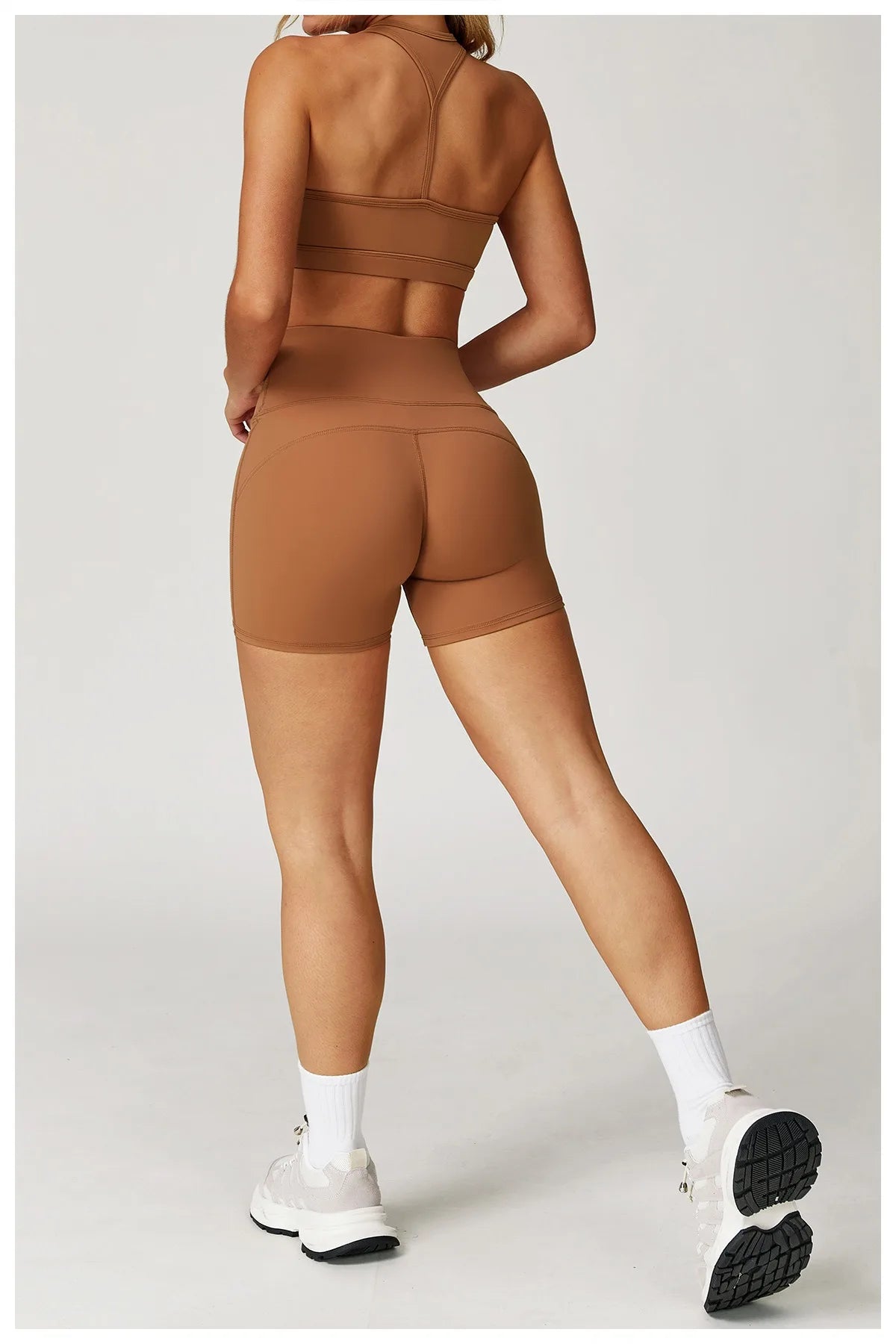 Xooie Fit brown two-piece set of high-performance activewear with shorts and sports bra