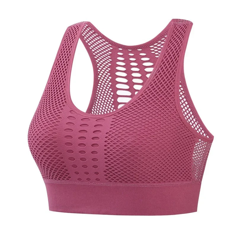 Xooie Fit high-performance workout bra in pink with breathable mesh design for optimal comfort and support