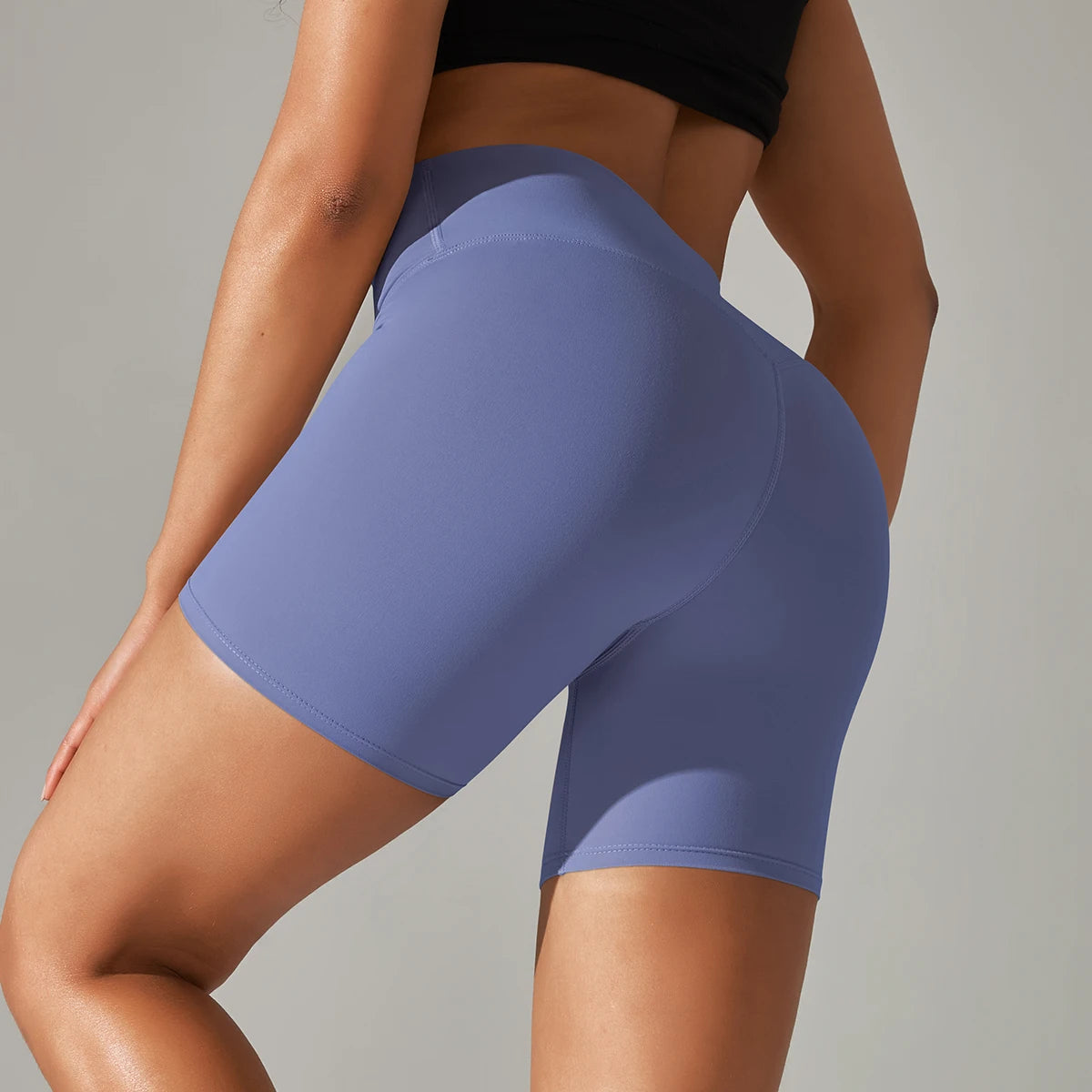 Xooie Fit high quality active shorts in blue worn during workout for women