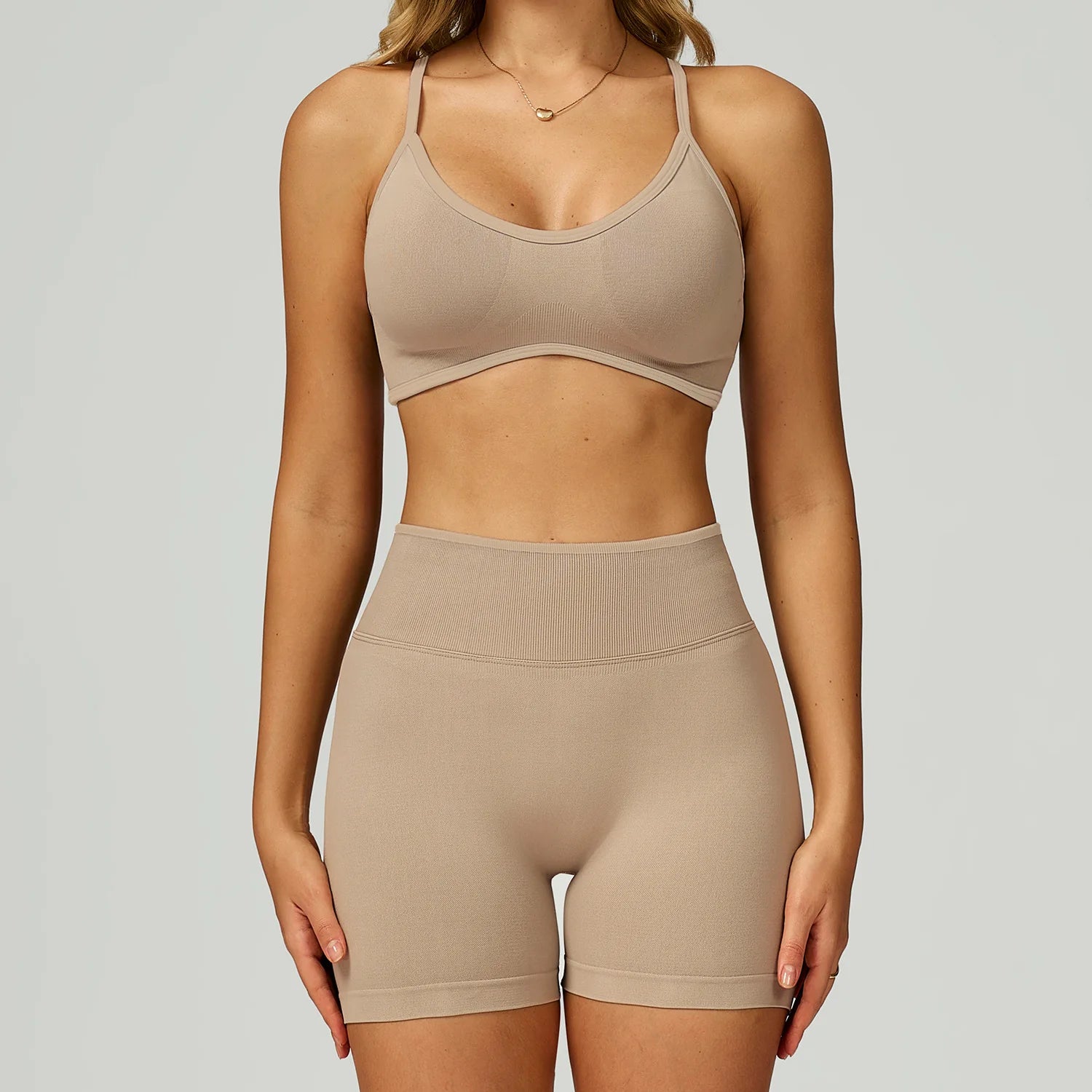Xooie Fit high quality women's activewear set with a cropped top and high-waisted shorts in a neutral tone