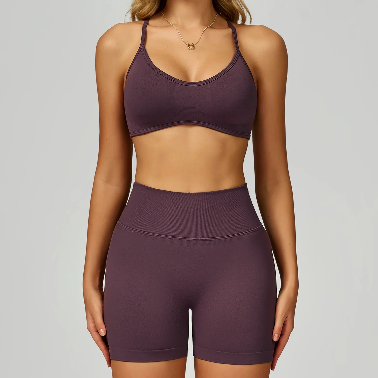 Xooie Fit high quality women's activewear set including a sports bra and shorts in a rich plum shade