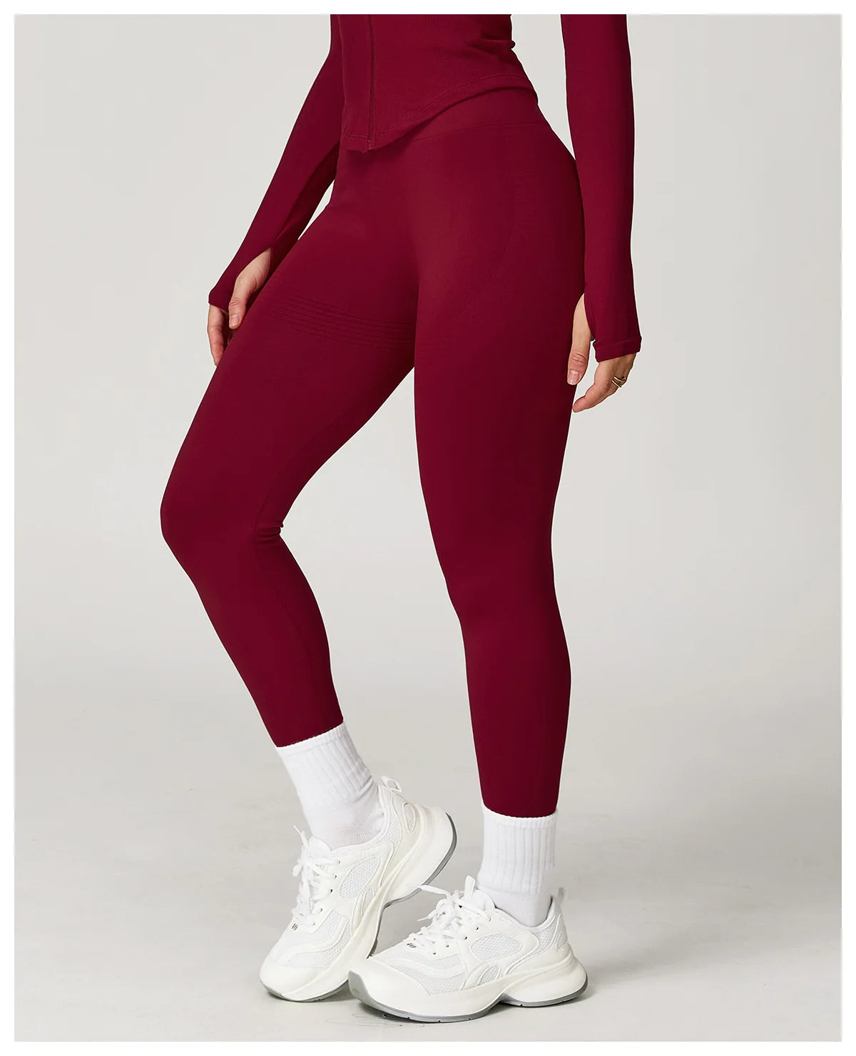 High-waisted active leggings in cherry red, full length with smooth seam detail
