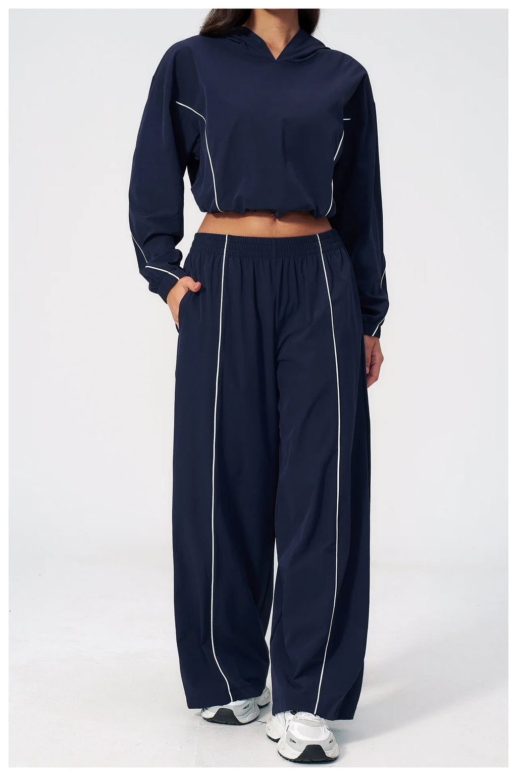 Women’s hooded zip sports set with long sleeves and wide-leg pants, navy blue, front view