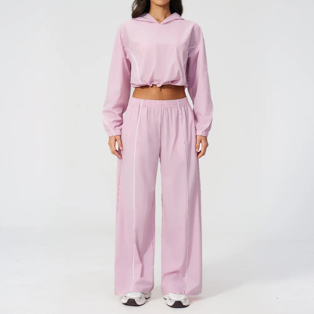 Women’s lilac pink hooded sports set with contrast piping, cropped jacket and wide-leg pants