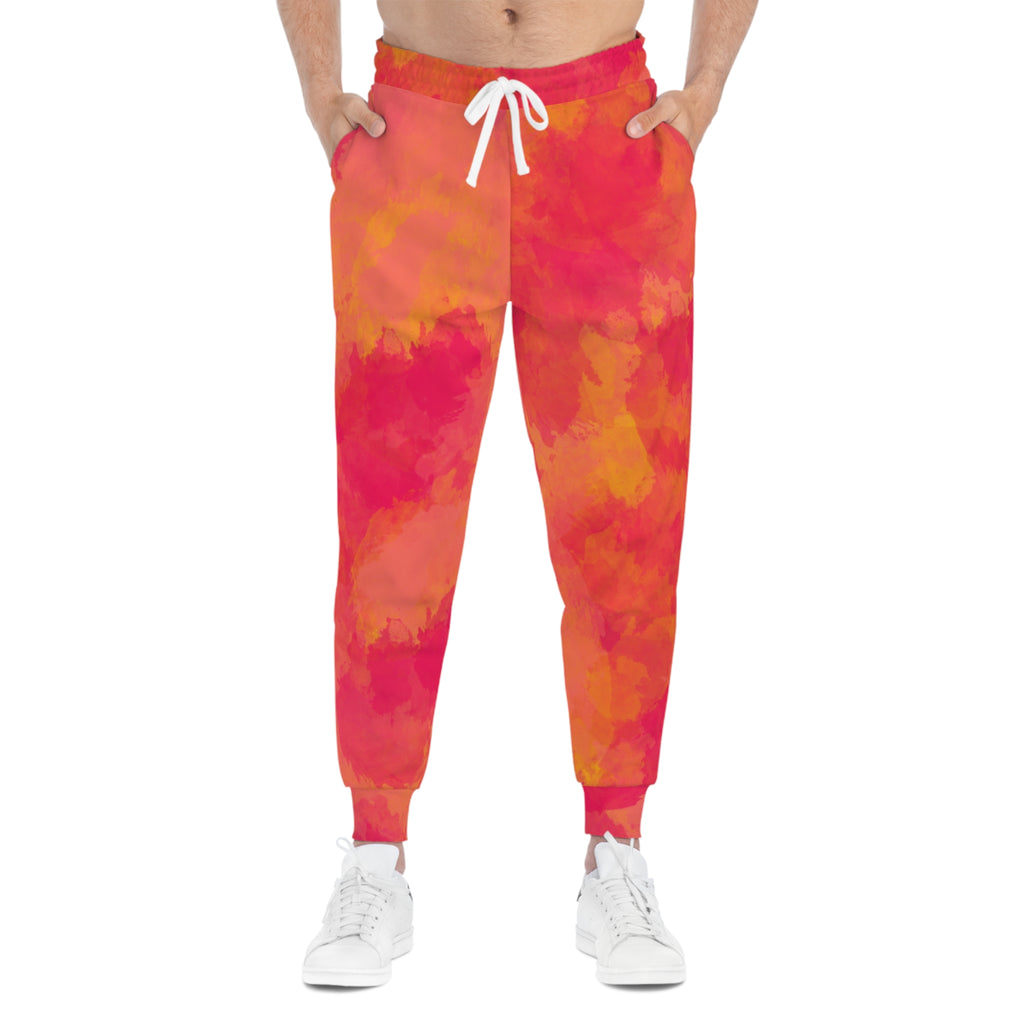 Pink-orange watercolor tie-dye sweatpants with white drawstring waist and tapered legs