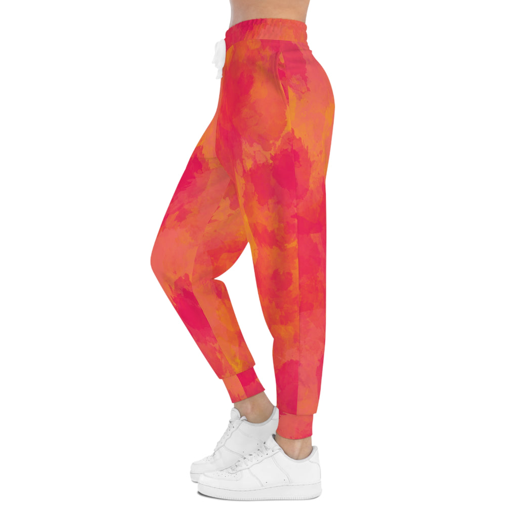 Pink-orange watercolor tie-dye athletic joggers, tapered leg with elastic cuff hem