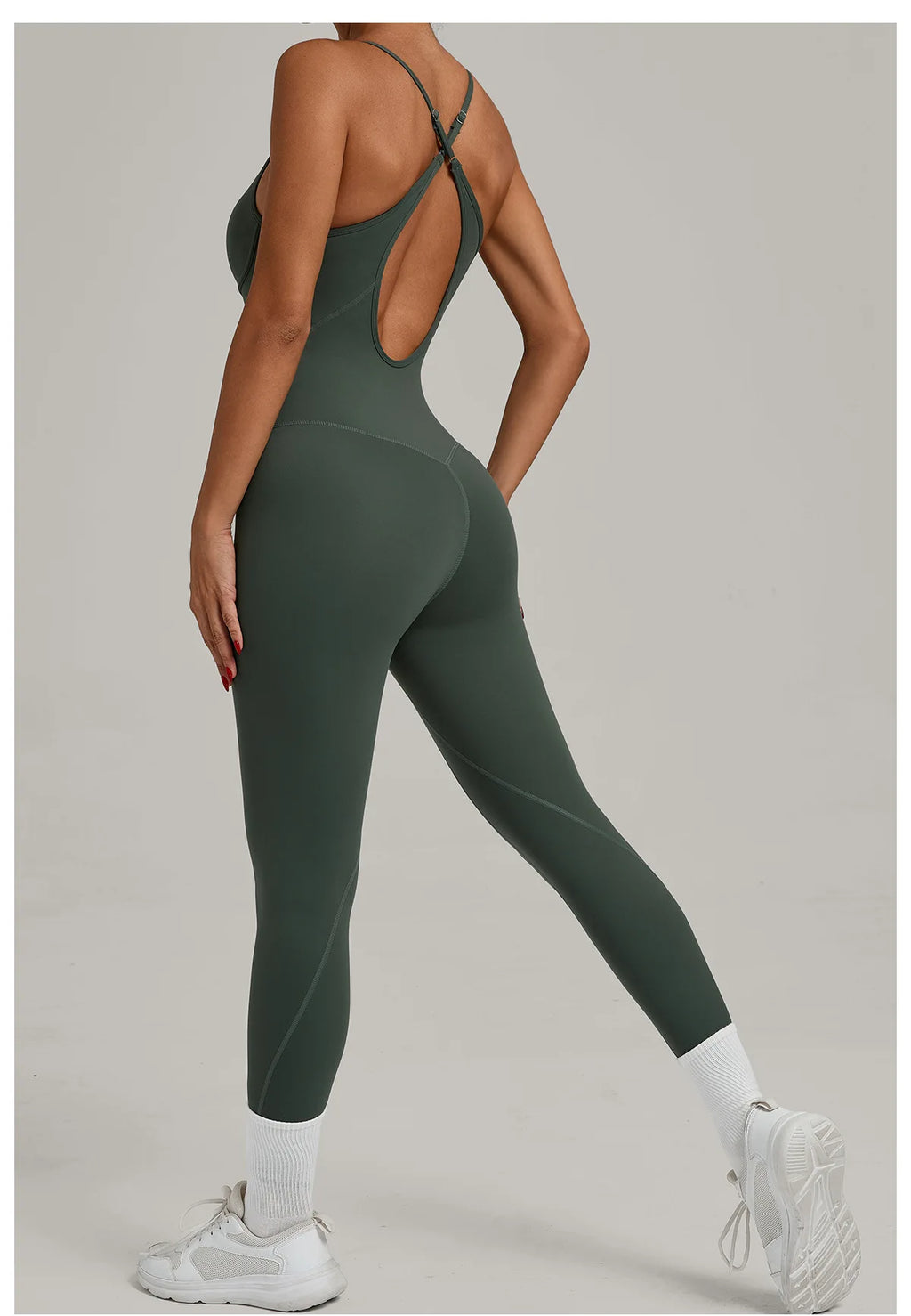 Women’s sleeveless yoga jumpsuit, open back with crisscross straps, basil green, full-length