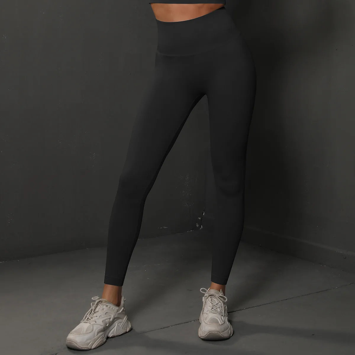 High-waist black yoga leggings, full-length fitted legs with smooth waistband