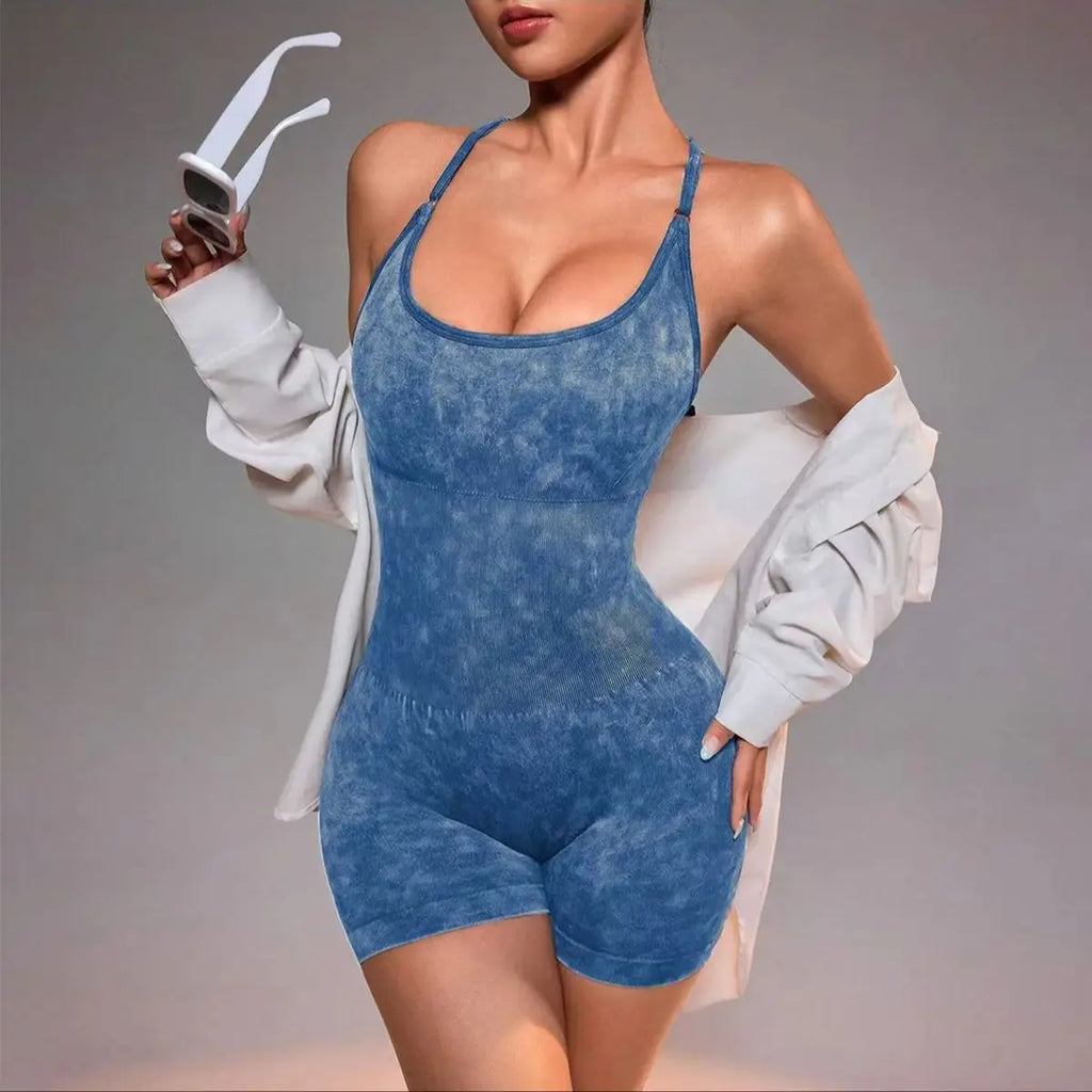 Washed blue strappy yoga unitard romper with scoop neckline, seamless shorts