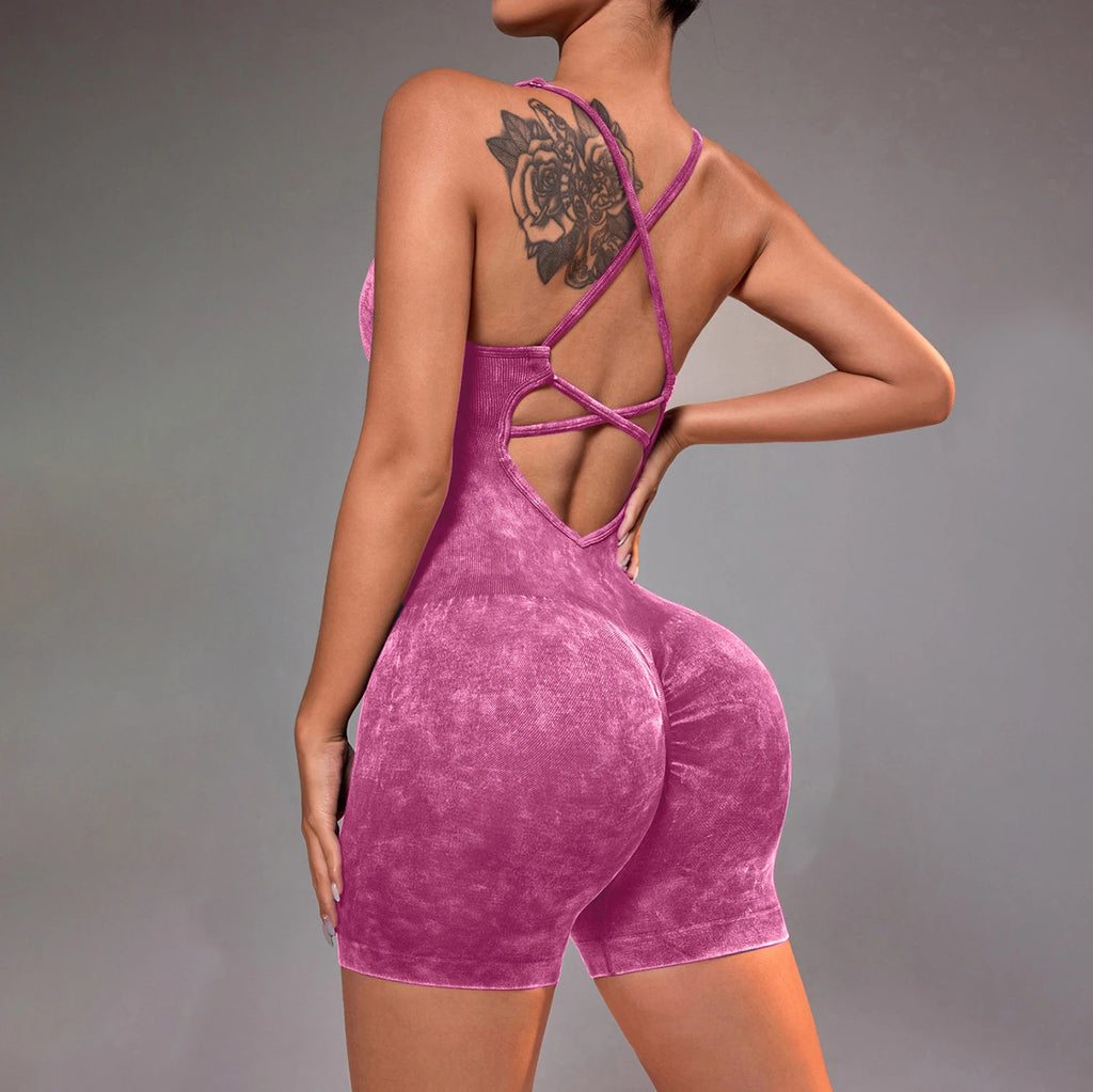 Distressed washed yoga bodysuit with strappy open-back one-piece short, purple
