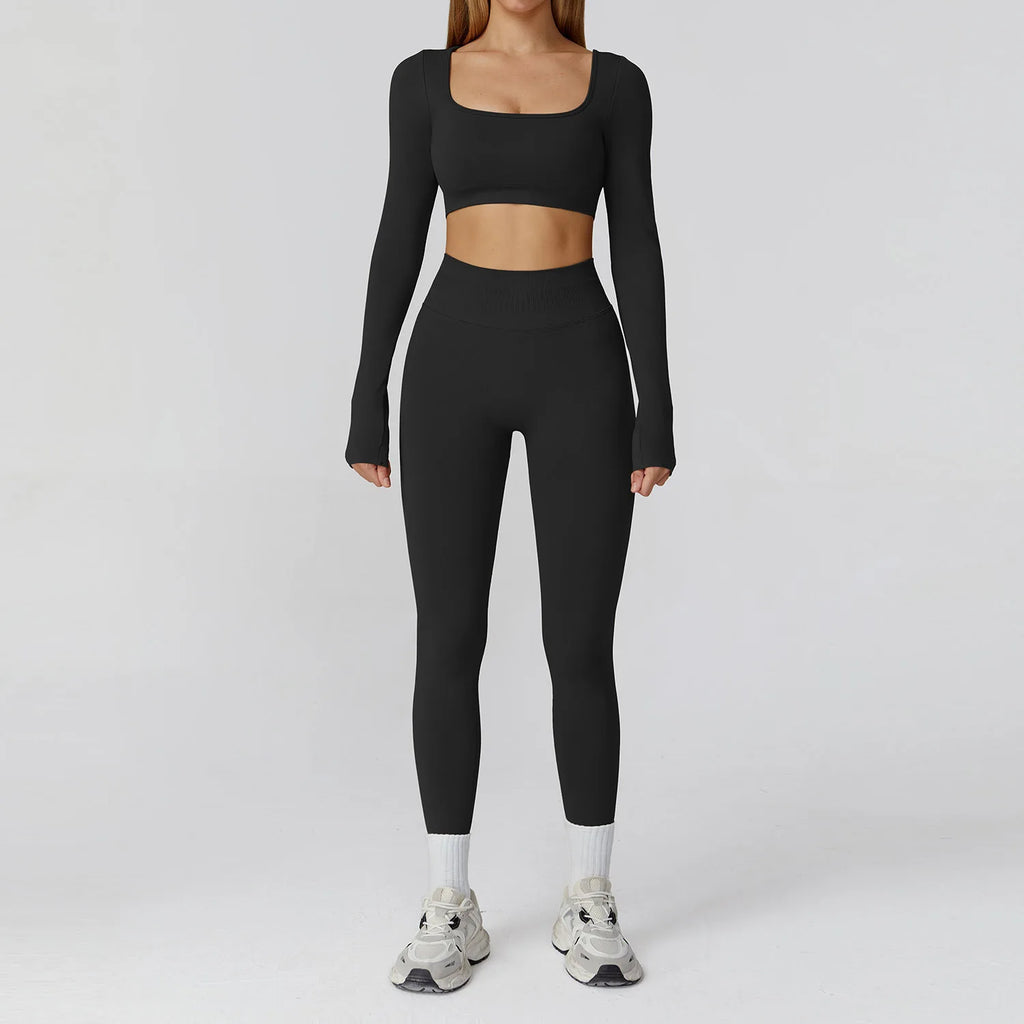 Xooie Fit long sleeve crop top and leggings set in black, perfect for workouts and casual wear