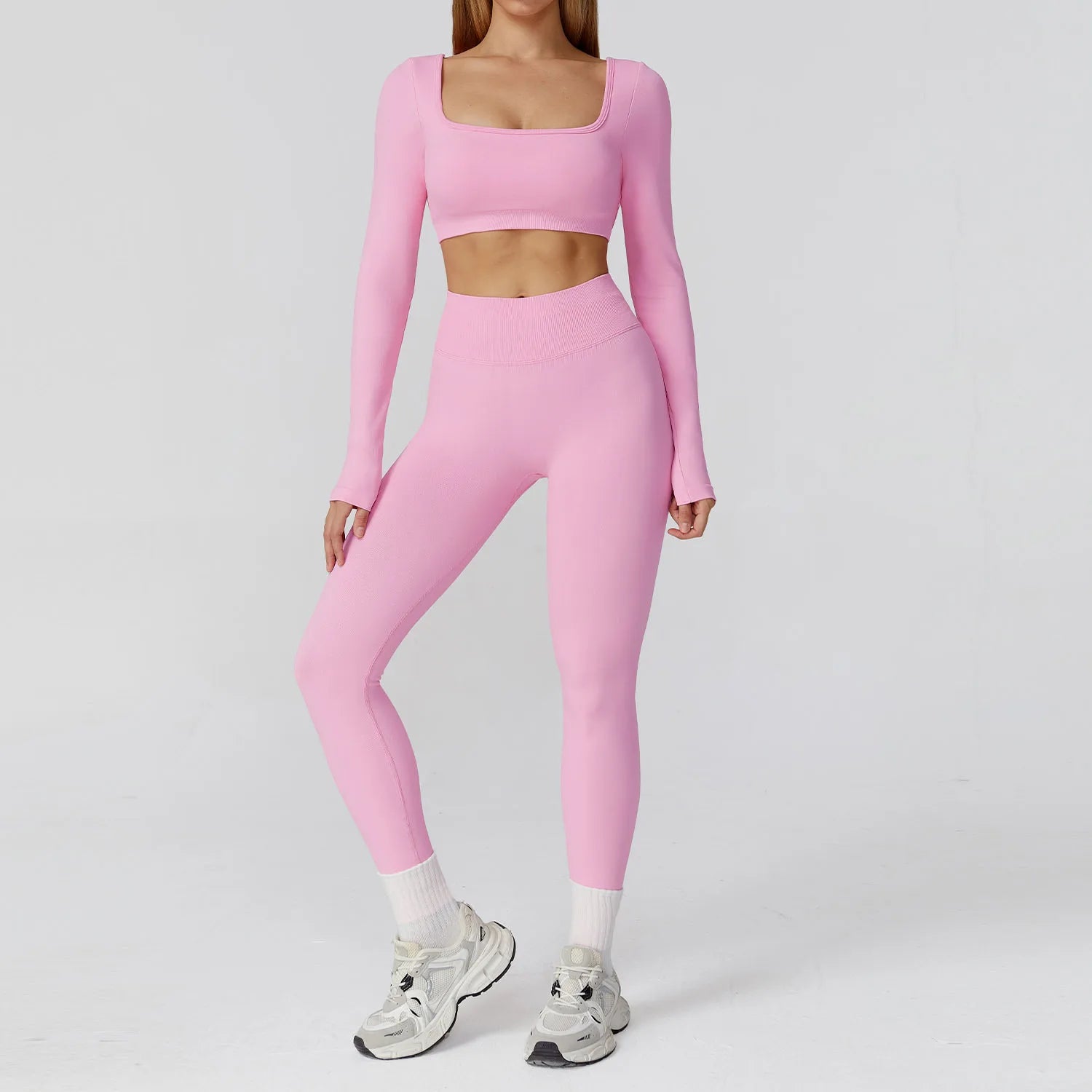 Xooie Fit long sleeve crop top and leggings set in pink for stylish and comfortable active wear