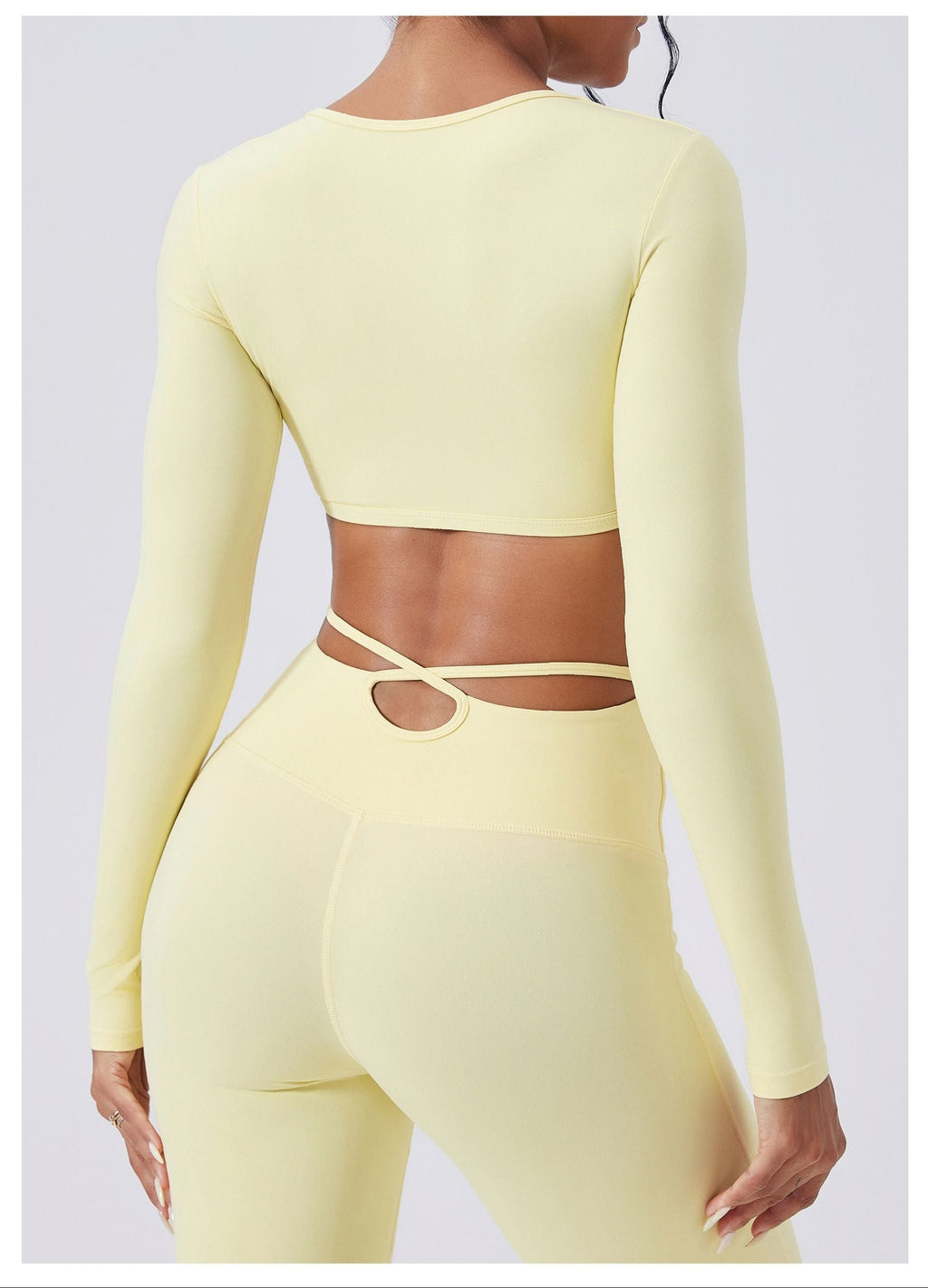 Xooie Fit Yellow Long Sleeve Crop Top for Women with Open Back Design and Comfortable Fit