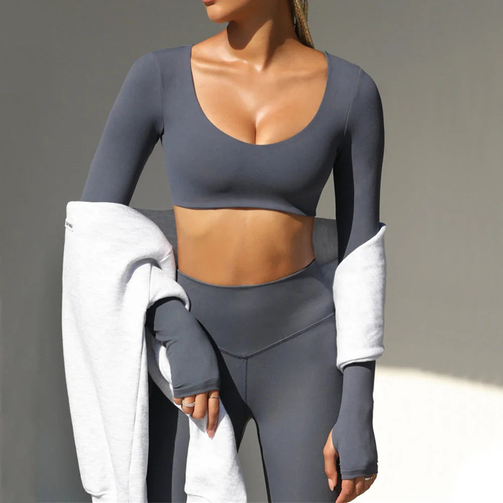 Xooie Fit long sleeve crop top with finger holes in grey for a stylish athletic look