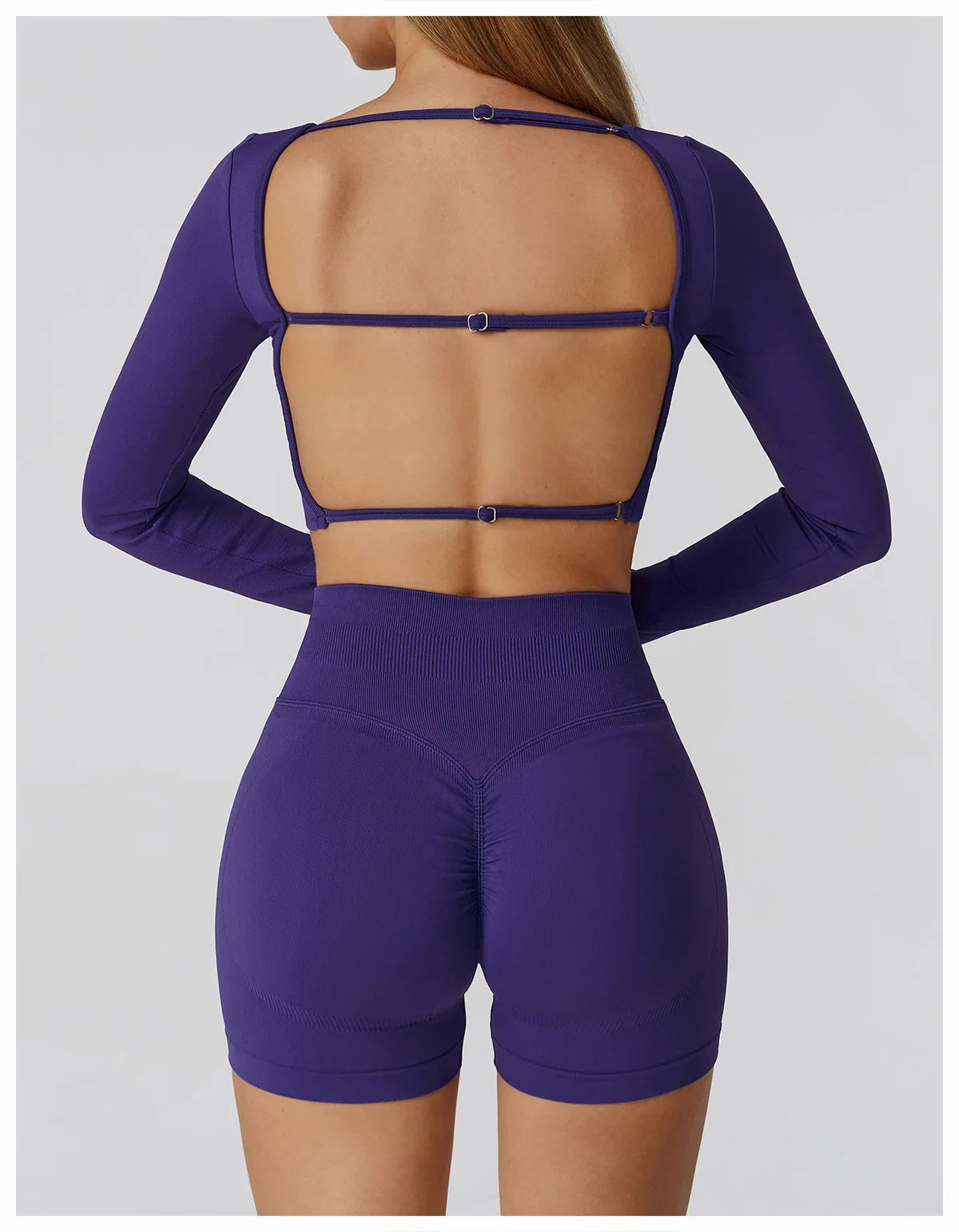 Xooie Fit long sleeve gym crop top and shorts set in purple with stylish open back design