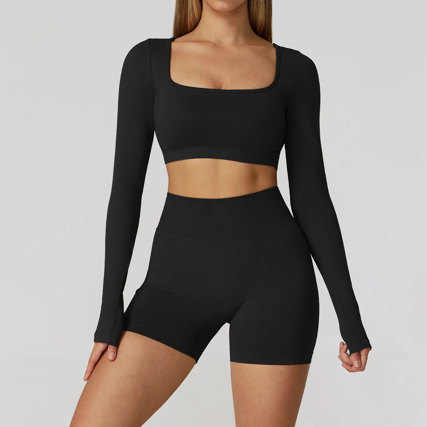 Xooie Fit long sleeve gym crop top and shorts set in black for stylish workout attire