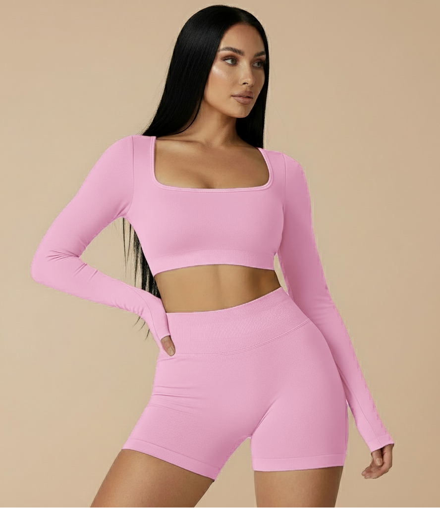 Xooie Fit long sleeve gym crop top and shorts set in pink, perfect for workouts and casual wear