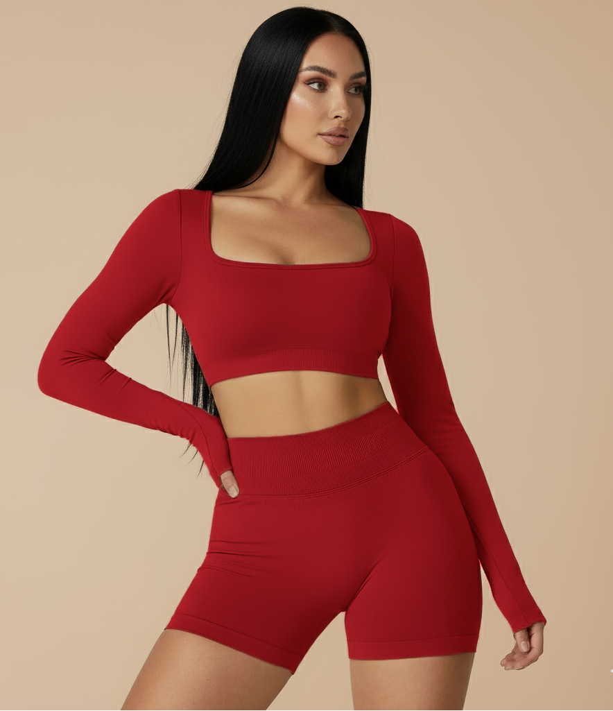 Xooie Fit Red Two-Piece Set featuring a long sleeve gym crop top and shorts for stylish workouts