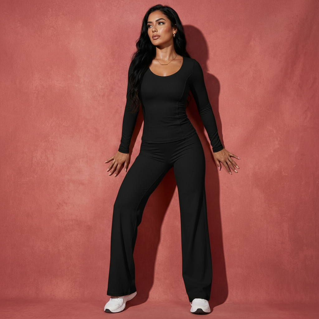 Black long-sleeve active shirt and flare pants matching set, full-body front view