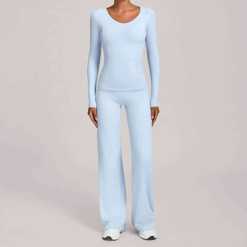 Xooie Fit long sleeve shirt flare pants set in light blue for comfortable and stylish workouts