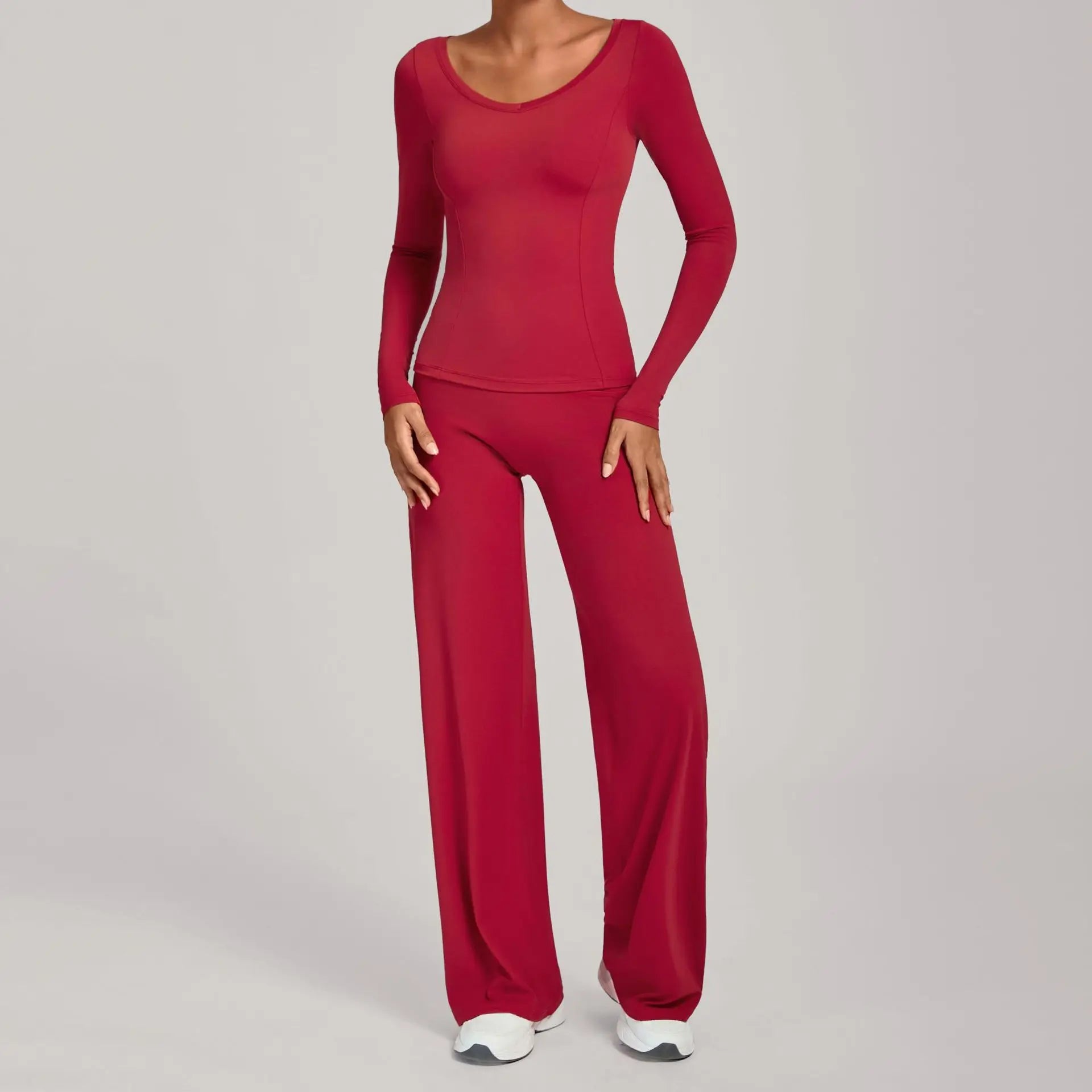 Xooie Fit long sleeve shirt flare pants set in red, perfect for casual outings or workouts