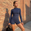Navy blue textured long-sleeve fitted top and matching high-waist shorts set