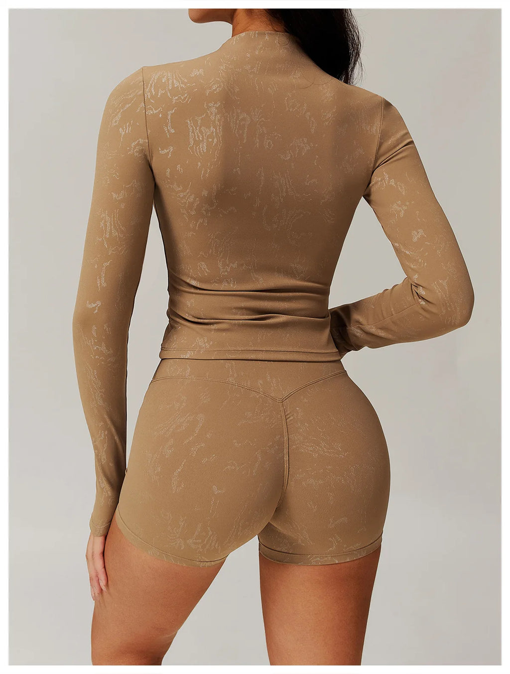 Light brown textured long-sleeve fitted top and matching high-waist shorts set, back view