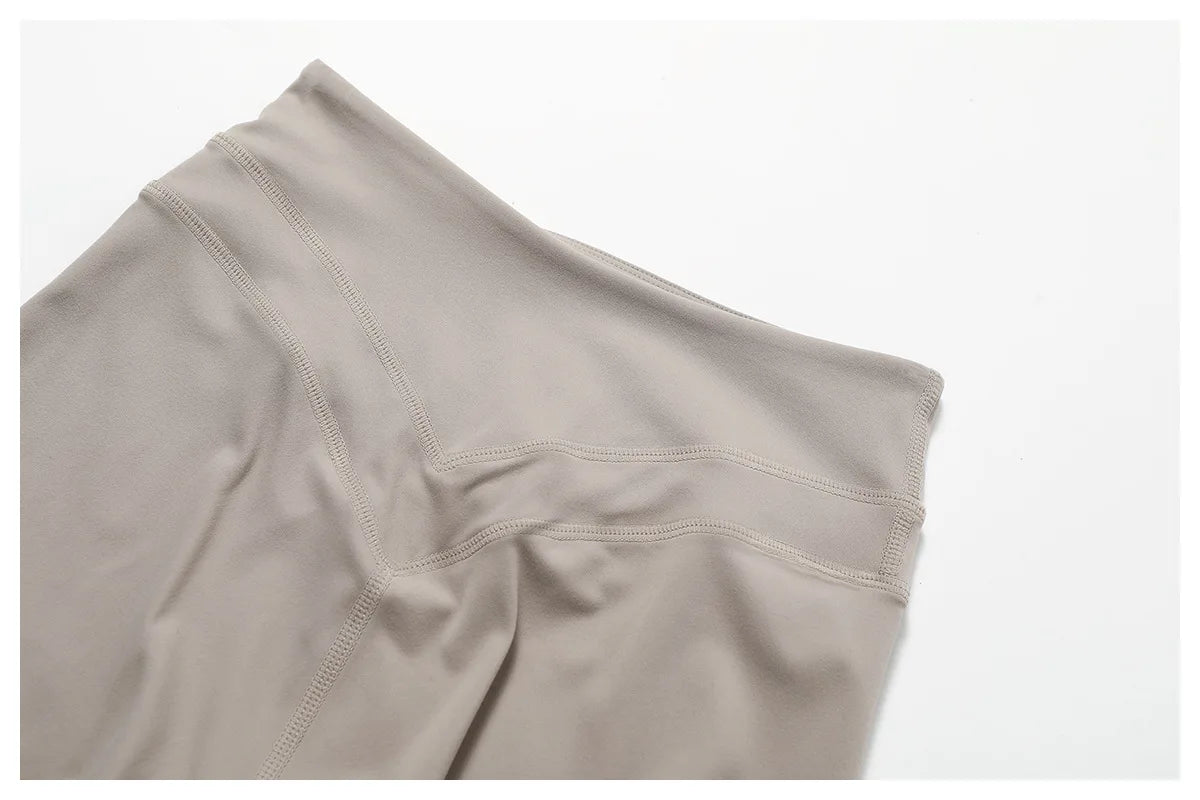 Close-up of a neutral-toned waistband from a matching workout set for running by Xooie Fit 2