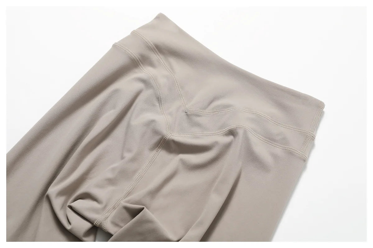 Close-up of a neutral-toned waistband from a matching workout set for running by Xooie Fit 3