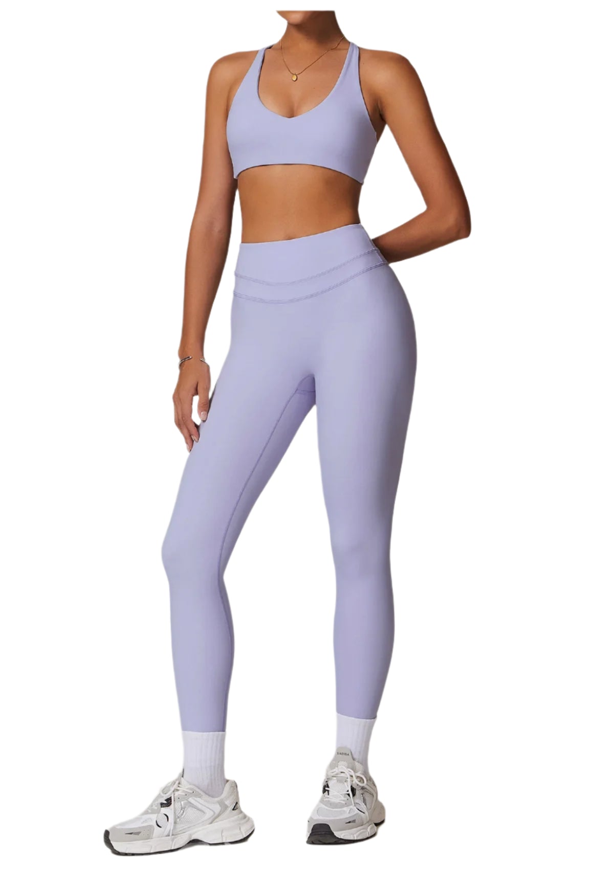 Light purple Xooie Fit matching workout set for running featuring a sports bra and high-waisted leggings