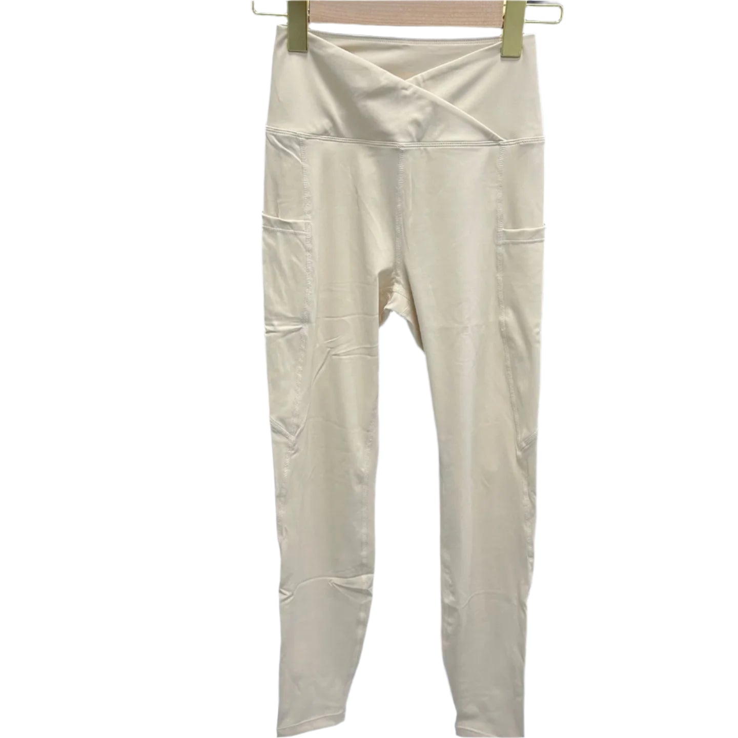 Cream High-Waisted Leggings from Xooie Fit, part of a matching yoga set for women