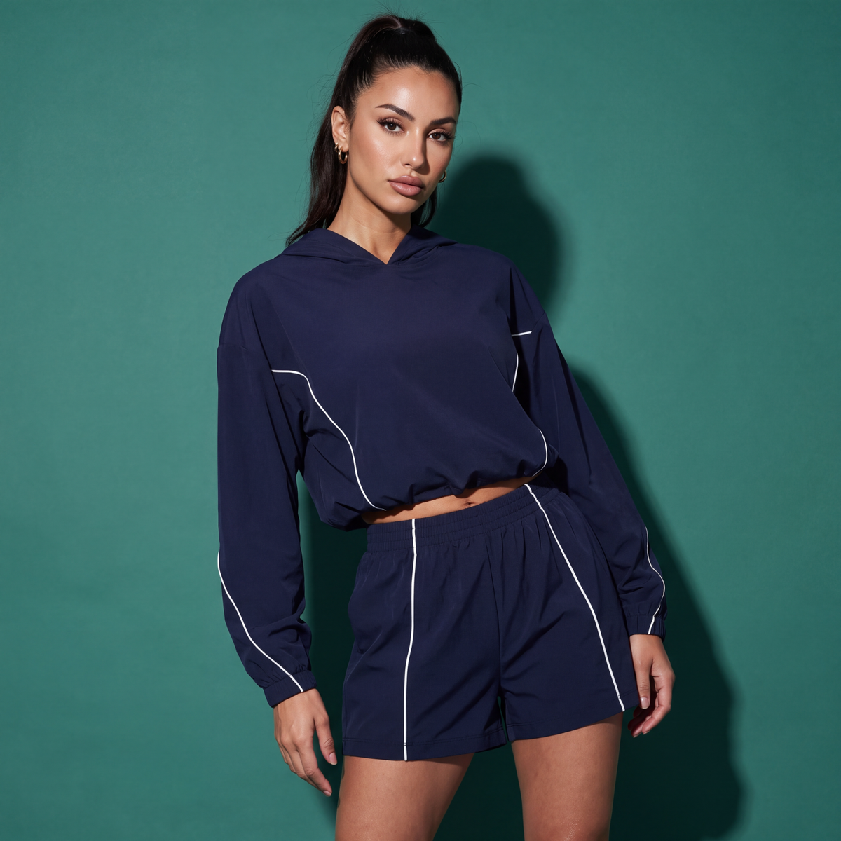 Navy cropped hooded sweatshirt and drawstring shorts set with white piping