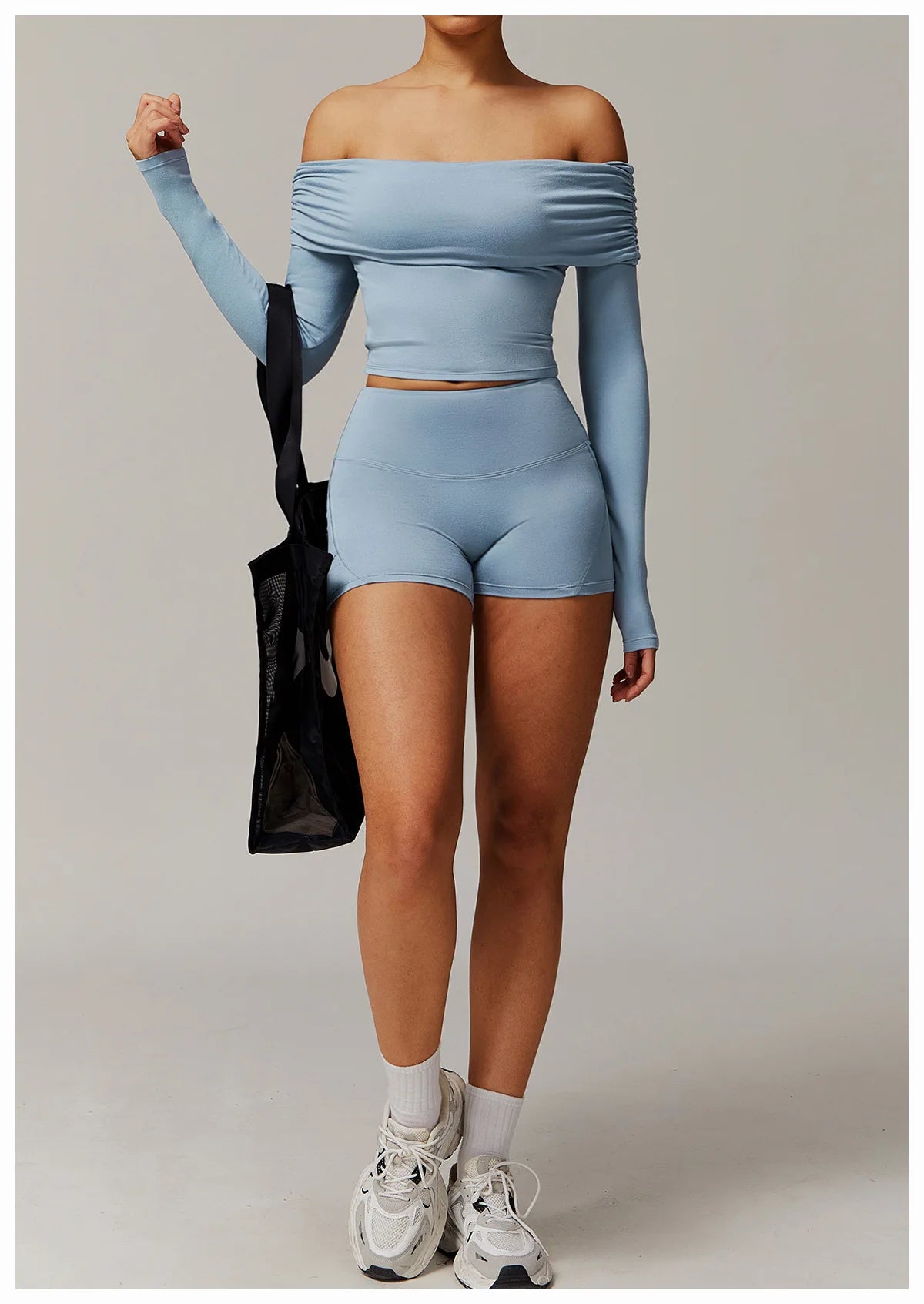Xooie Fit light blue off shoulder workout set with long sleeves and high-waisted shorts1