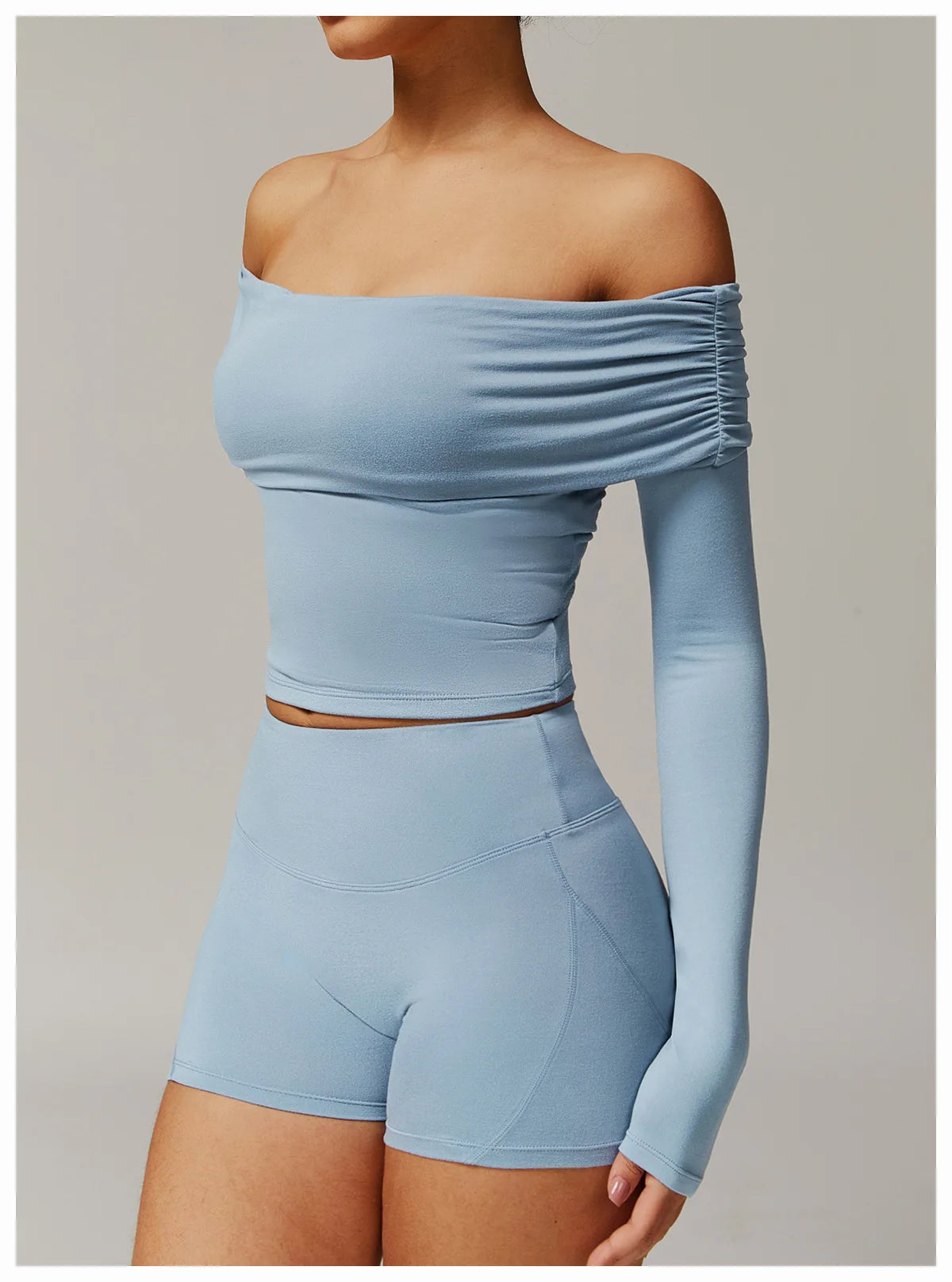 Xooie Fit light blue off shoulder workout set two-piece with long sleeve top and high-waist shorts