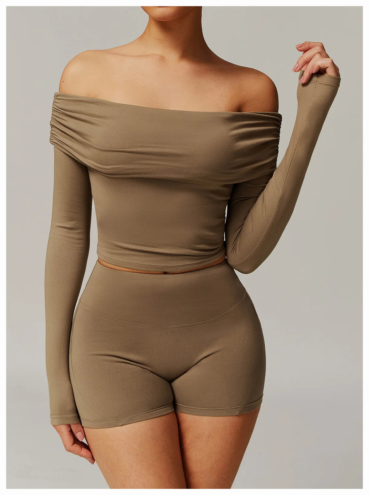 Xooie Fit two-piece off shoulder workout set in brown with long sleeves and fitted shorts