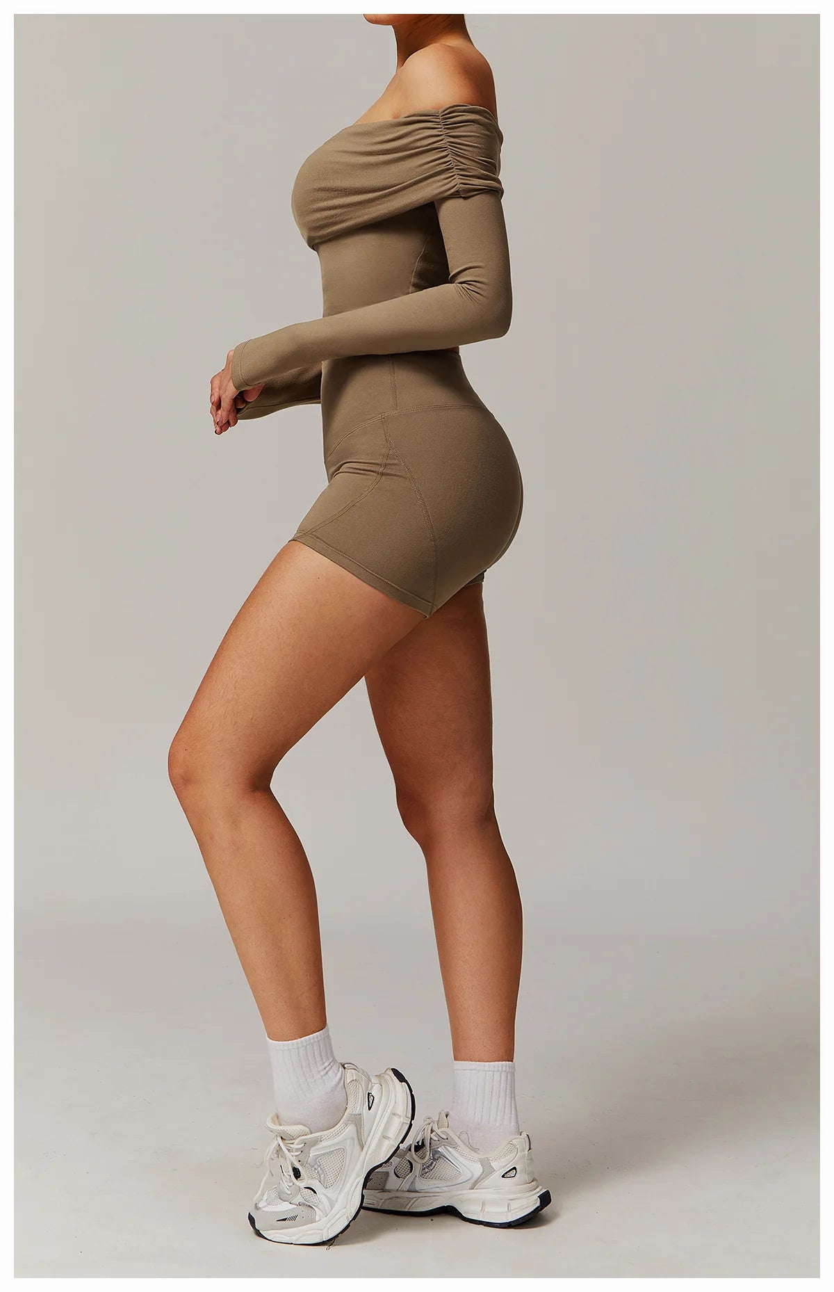 Xooie Fit off shoulder workout set in brown with ruched long sleeves and fitted shorts