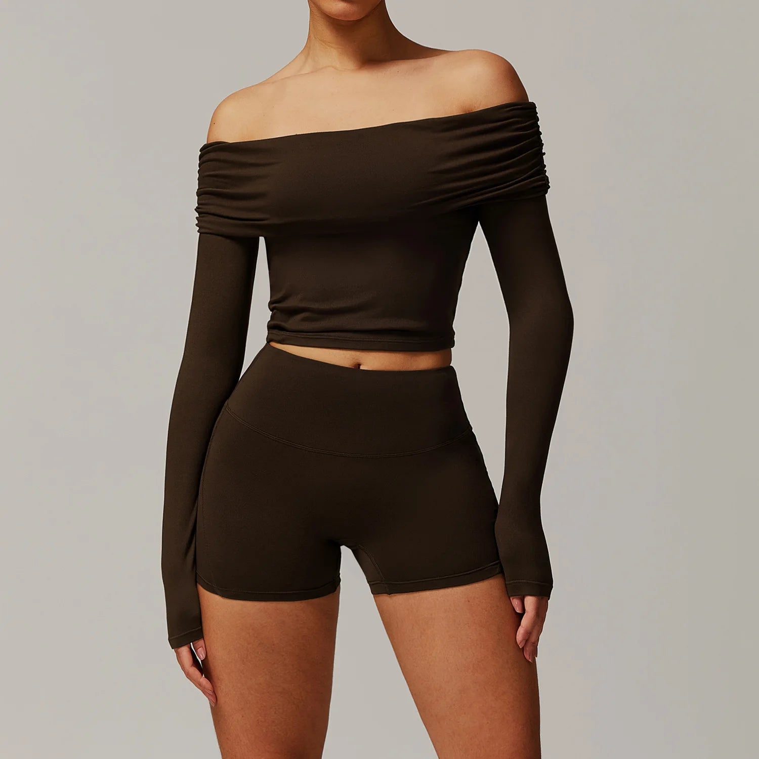 Xooie Fit black off shoulder workout set two-piece with long sleeves and fitted shorts