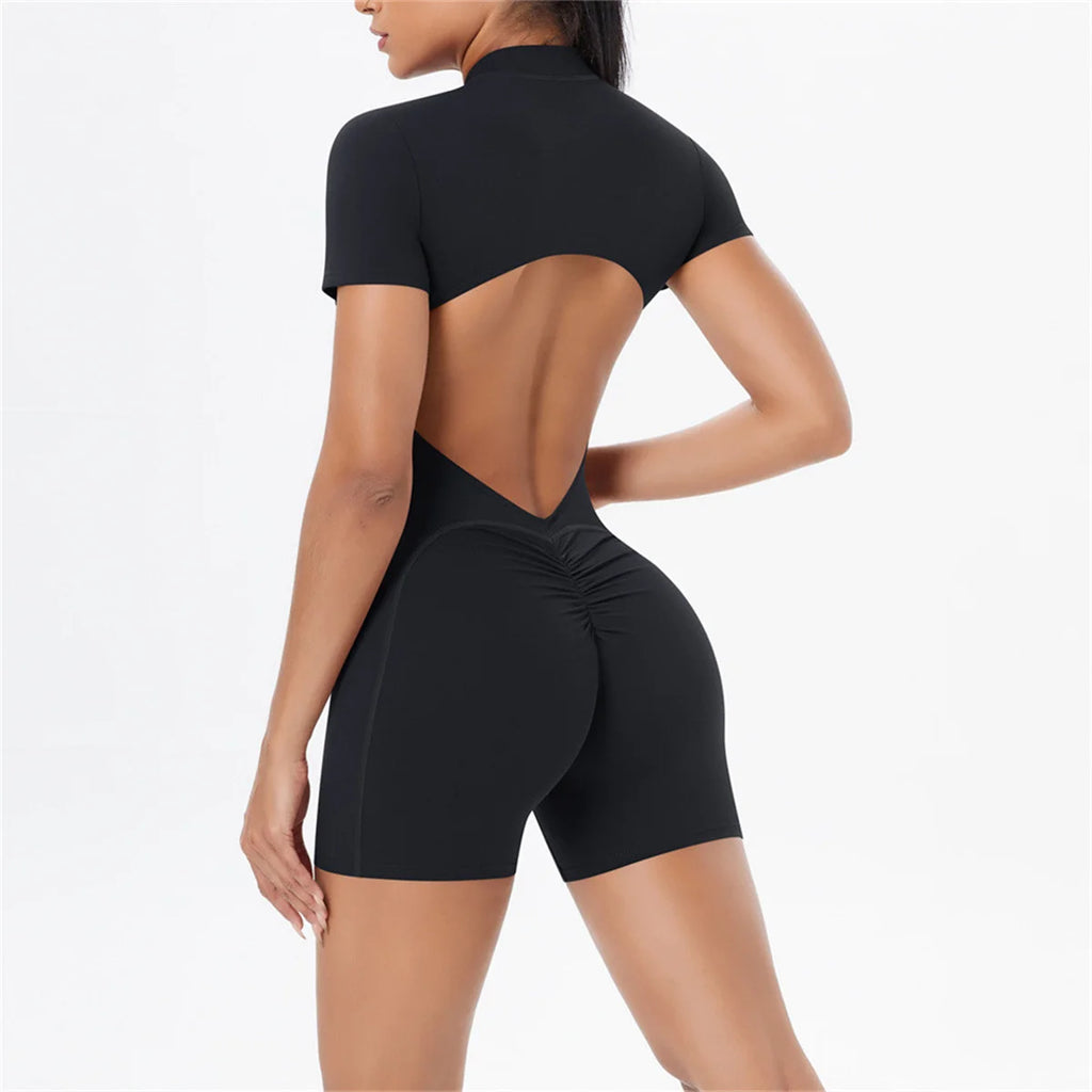 Xooie Fit one-piece workout jumpsuit with zipper featuring a stylish open back design black